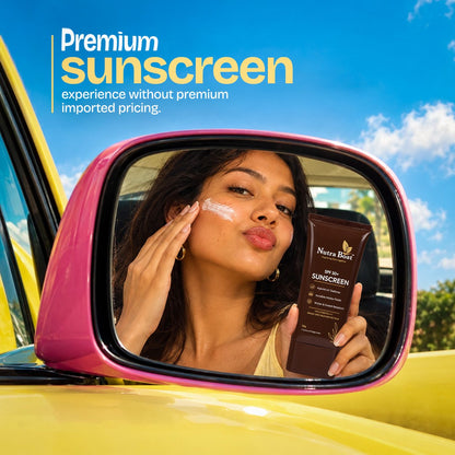 Woman applying Nutraboat Sunscreen in a car mirror